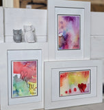 Collageramme med 3 fargerike akvareller