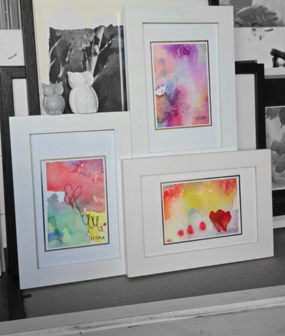 Collageramme med 3 fargerike akvareller